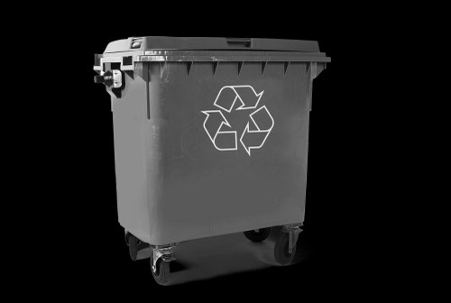Crew segregating recyclable and non-recyclable commercial waste